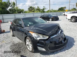 2013 Hyundai Veloster w/Gray Int z VIN KMHTC6AD1DU101406, wystawiony jako Copart lot #55087095 z przebiegiem 115 373 mil mil oraz Szkoda całkowita • Salvage title. Historia ofert i sprzedaży dostępna na DreamBid. Obrazek 4.
