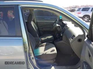 2006 Hyundai Tucson GL with VIN KM8JM12B76U276847, listed as a IAAI auction lot 41767240 with 204,713 mi miles. Bid and sale history available at carsss.com. Image 5.