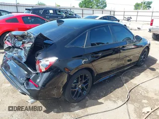 2023 Honda Civic Sport with VIN 2HGFE2F58PH557787, listed as a IAAI auction lot 42207827 with 51,885 mi miles and . Bid and sale history available at DreamBid. Image 4.