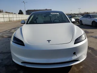 2025 Tesla Model 3 Long Range with VIN 5YJ3E1EAXSF935004, listed as a Copart auction lot 52233195 with 5,873 mi miles and Salvage Title. Bid and sale history available at carsss.com. Image 5.