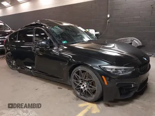 2018 BMW M3 with VIN WBS8M9C5XJ5L71599, listed as a IAAI auction lot 41932825 with 53,730 mi miles. Bid and sale history available at carsss.com. Image 1.