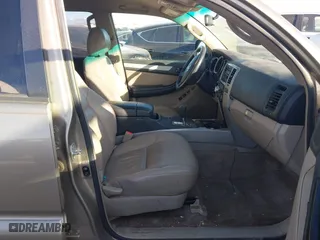 2006 Toyota 4Runner SR5 with VIN JTEBU14R568055724, listed as a IAAI auction lot 41450451 with 230,598 mi miles. Bid and sale history available at carsss.com. Image 5.