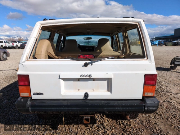 1995 Jeep Cherokee Sport with VIN 1J4FJ68S0SL502065, listed as a Copart auction lot 46431765 with 138,582 mi miles and Salvage Title. Bid and sale history available at carsss.com. Image 6.