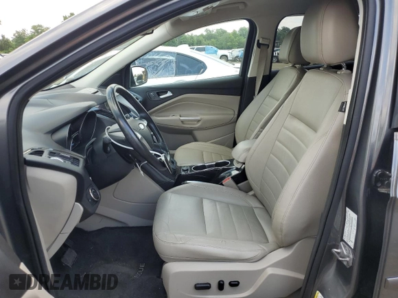 2014 Ford Escape Titanium with VIN 1FMCU9J91EUC90702, listed as a Copart auction lot 59116194 with 117,984 mi miles and Salvage Title. Bid and sale history available at DreamBid. Image 7.
