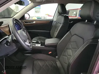 2024 Volkswagen Atlas SE z VIN 1V2HR2CA9RC558223, wystawiony jako IAAI lot #42734557 z przebiegiem 22 426 mil mil oraz . Historia ofert i sprzedaży dostępna na DreamBid. Obrazek 29.