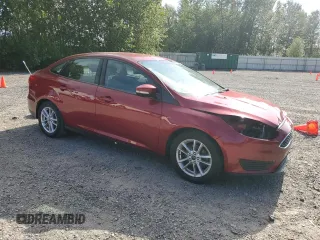 2015 Ford Focus SE with VIN 1FADP3F24FL386359, listed as a Copart auction lot 63519185 with 114,079 mi miles and Salvage title. Bid and sale history available at DreamBid. Image 4.