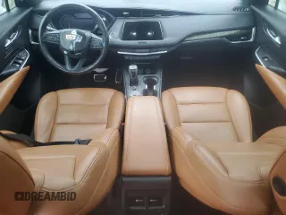 2019 Cadillac XT4 FWD Sport z VIN 1GYFZER49KF199885, wystawiony jako Copart lot #56836895 z przebiegiem 58 486 mil mil oraz Szkoda całkowita • Salvage title. Historia ofert i sprzedaży dostępna na DreamBid. Obrazek 8.