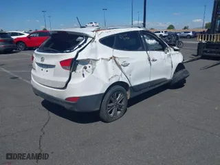 2014 Hyundai Tucson Limited with VIN KM8JU3AG1EU904778, listed as a IAAI auction lot 41355280 with 151,952 mi miles. Bid and sale history available at carsss.com. Image 4.