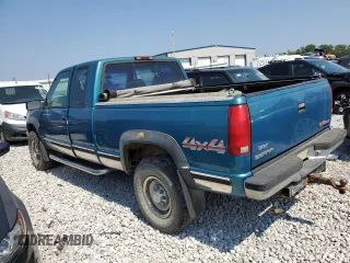 1997 GMC Sierra 2500 z VIN 1GTGK29JXVE562949, wystawiony jako Copart lot #68270174 z przebiegiem 212 422 mil mil oraz Szkody całkowita. Historia ofert i sprzedaży dostępna na DreamBid. Obrazek 2.