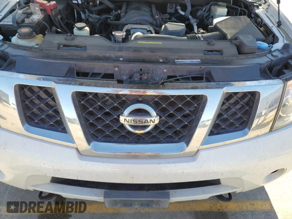 2015 Nissan Armada SV z VIN 5N1BA0ND8FN616053, wystawiony jako Copart lot #88253385 z przebiegiem 211 004 mil mil oraz Szkoda całkowita • Salvage title. Historia ofert i sprzedaży dostępna na DreamBid. Obrazek 12.