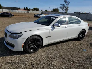 2011 BMW 7 Series 740Li with VIN WBAKB4C58BC573888, listed as a Copart auction lot 78736874 with 76,832 mi miles and Salvage Title. Bid and sale history available at DreamBid. Image 1.