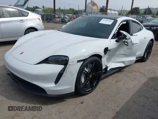 2022 Porsche Taycan z VIN WP0AA2Y12NSA13356, wystawiony jako IAAI lot #42083009 z przebiegiem Nie podano mil oraz . Historia ofert i sprzedaży dostępna na DreamBid. Obrazek 2.