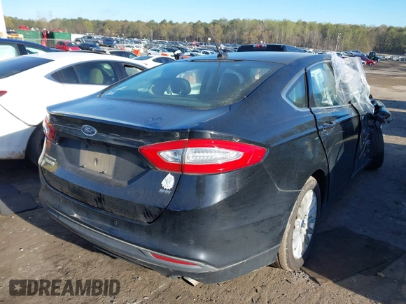 2016 Ford Fusion Energi SE Luxury with VIN 3FA6P0PU5GR373212, listed as a IAAI auction lot 41875297 with 93,049 mi miles. Bid and sale history available at carsss.com. Image 4.