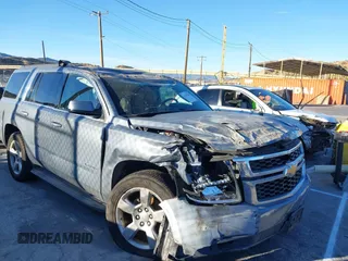 2016 Chevrolet Tahoe LS with VIN 1GNSCAKC0GR413515, listed as a IAAI auction lot 41249760 with 163,107 mi miles and . Bid and sale history available at DreamBid. Image 6.