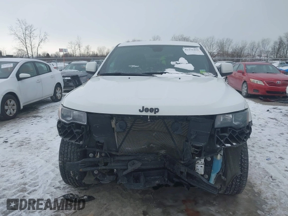 2018 Jeep Grand Cherokee Laredo E with VIN 1C4RJFAG1JC499457, listed as a IAAI auction lot 41379459 with 127,344 mi miles and . Bid and sale history available at DreamBid. Image 13.