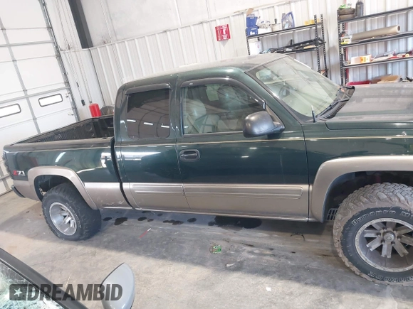 2005 Chevrolet Silverado 1500 Z71 with VIN 1GCEK19B15E272187, listed as a IAAI auction lot 42001487 with 313,138 mi miles and . Bid and sale history available at DreamBid. Image 13.