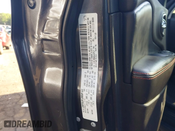 2014 Jeep Cherokee Trailhawk with VIN 1C4PJMBS6EW167517, listed as a IAAI auction lot 41947552 with 233,572 mi miles. Bid and sale history available at carsss.com. Image 9.