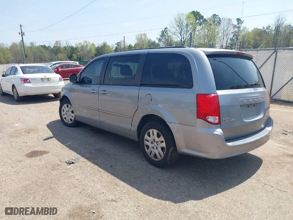 2014 Dodge Grand Caravan SXT with VIN 2C4RDGCG3ER128971, listed as a IAAI auction lot 41921386 with 255,074 mi miles. Bid and sale history available at carsss.com. Image 3.