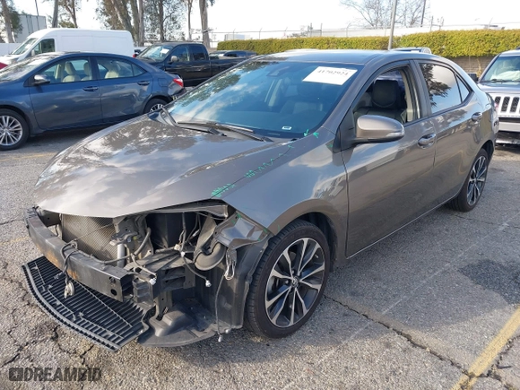 2019 Toyota Corolla L with VIN 5YFBURHEXKP922883, listed as a IAAI auction lot 41702924 with 99,166 mi miles. Bid and sale history available at carsss.com. Image 18.