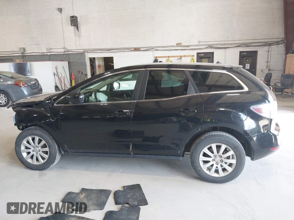 2010 Mazda CX-7 Sport with VIN JM3ER2WMXA0305807, listed as a IAAI auction lot 42022020 with 200,905 mi miles and . Bid and sale history available at DreamBid. Image 14.