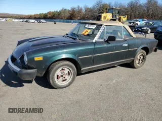 1979 FIAT 124 Spider z VIN 124CS20151060, wystawiony jako Copart lot #78019714 z przebiegiem 95 504 mil mil oraz Czysty tytuł • Clean title. Historia ofert i sprzedaży dostępna na DreamBid. Obrazek 1.