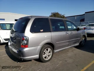 2004 Mazda MPV LX with VIN JM3LW28AX40506050, listed as a Copart auction lot 74335234 with 211,708 mi miles and Salvage Title. Bid and sale history available at carsss.com. Image 3.