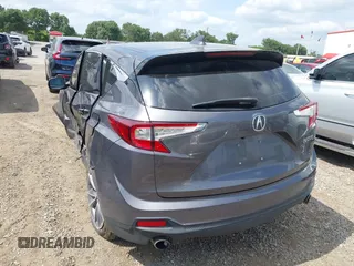 2021 Acura RDX Technology with VIN 5J8TC1H50ML003867, listed as a IAAI auction lot 42150473 with 55,426 mi miles and . Bid and sale history available at DreamBid. Image 3.