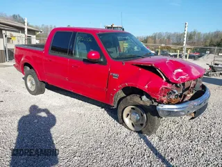2003 Ford F-150 XLT with VIN 1FTRW08L53KB94103, listed as a IAAI auction lot 42020356 with 203,419 mi miles. Bid and sale history available at carsss.com. Image 1.