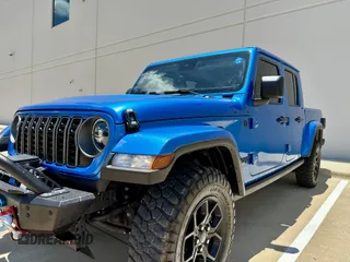 2024 Jeep Gladiator Sport S with VIN 1C6HJTAG0RL123040, listed as a IAAI auction lot 42628429 with 15,046 mi miles and . Bid and sale history available at DreamBid. Image 2.
