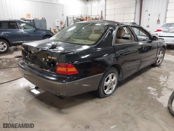 1999 Lexus ES 300 Luxury Sport Sdn with VIN JT8BF28G0X5065091, listed as a IAAI auction lot 41416601 with NaN miles. Bid and sale history available at carsss.com. Image 4.