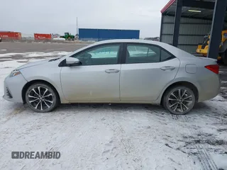 2019 Toyota Corolla L z VIN 5YFBURHE7KP928799, wystawiony jako IAAI lot #41232273 z przebiegiem 130 733 mil mil oraz . Historia ofert i sprzedaży dostępna na DreamBid. Obrazek 14.