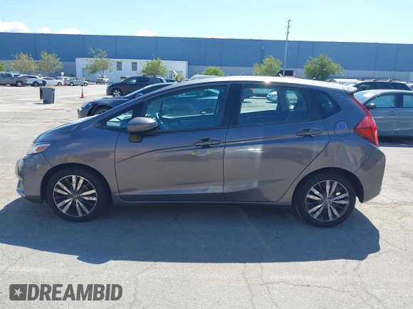 2015 Honda Fit EX-L z VIN 3HGGK5H86FM746265, wystawiony jako IAAI lot #42253205 z przebiegiem 75 491 mil mil oraz . Historia ofert i sprzedaży dostępna na DreamBid. Obrazek 14.
