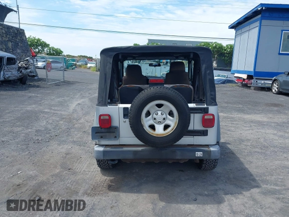 2004 Jeep Wrangler Sport with VIN 1J4FA49S04P781581, listed as a IAAI auction lot 42078693 with 111,123 mi miles and . Bid and sale history available at DreamBid. Image 16.