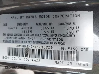2014 Mazda 3 i Sport with VIN JM1BM1K7XE1213729, listed as a IAAI auction lot 42098411 with 378,589 mi miles. Bid and sale history available at carsss.com. Image 9.