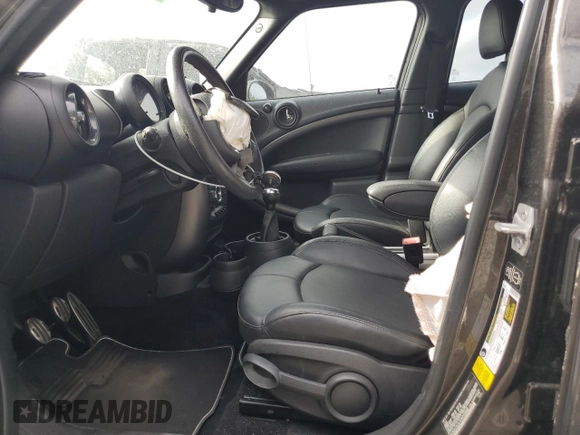 2015 MINI Countryman S with VIN WMWZC3C57FWP52868, listed as a Copart auction lot 54909085 with 68,003 mi miles and Salvage title. Bid and sale history available at DreamBid. Image 7.