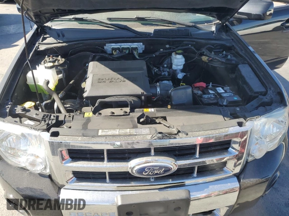 2012 Ford Escape Limited z VIN 1FMCU9EG3CKA65246, wystawiony jako Copart lot #57762675 z przebiegiem 161 568 mil mil oraz Szkoda całkowita • Salvage title. Historia ofert i sprzedaży dostępna na DreamBid. Obrazek 12.