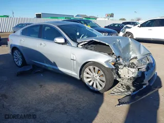 2009 Jaguar XF Premium Luxury with VIN SAJWA06B49HR13828, listed as a IAAI auction lot 41214648 with 125,564 mi miles. Bid and sale history available at carsss.com. Image 1.