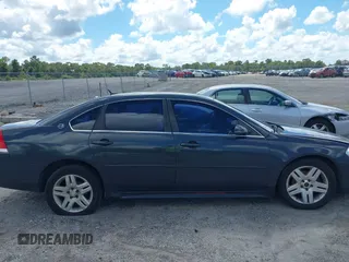 2014 Chevrolet Impala LT with VIN 2G1WB5E31E1146318, listed as a IAAI auction lot 40413281 with 422,345 mi miles and . Bid and sale history available at DreamBid. Image 13.
