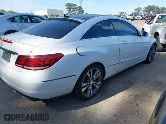 2015 Mercedes-Benz E-Class E 400 with VIN WDDKJ6FB5FF294900, listed as a IAAI auction lot 42067425 with 143,137 mi miles. Bid and sale history available at carsss.com. Image 4.
