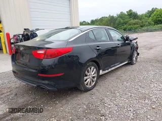 2014 Kia Optima EX z VIN 5XXGN4A77EG330968, wystawiony jako IAAI lot #42209541 z przebiegiem 106 888 mil mil oraz . Historia ofert i sprzedaży dostępna na DreamBid. Obrazek 4.