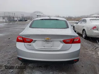2018 Chevrolet Malibu LT z VIN 1G1ZD5STXJF269890, wystawiony jako IAAI lot #41504935 z przebiegiem 107 190 mil mil oraz . Historia ofert i sprzedaży dostępna na DreamBid. Obrazek 16.
