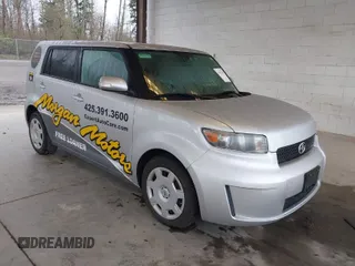 2010 Scion xB with VIN JTLZE4FE8A1114024, listed as a IAAI auction lot 41902287 with 100,312 mi miles. Bid and sale history available at carsss.com. Image 1.