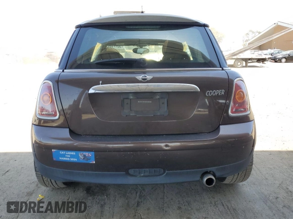 2010 MINI Hardtop with VIN WMWMF3C52ATZ62824, listed as a Copart auction lot 55175395 with 110,585 mi miles and Salvage Title. Bid and sale history available at DreamBid. Image 6.
