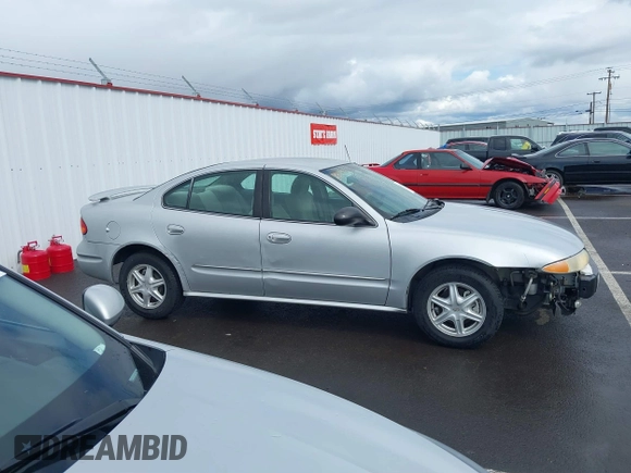 2003 Oldsmobile Alero GL1 z VIN 1G3NL52F93C310114, wystawiony jako IAAI lot #41778264 z przebiegiem Nie podano mil oraz . Historia ofert i sprzedaży dostępna na DreamBid. Obrazek 13.