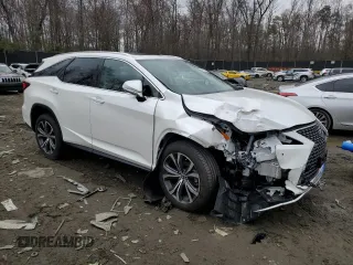 2022 Lexus RX with VIN JTJHZKFA5N2039857, listed as a Copart auction lot 42733963 with 7,011 mi miles. Bid and sale history available at carsss.com. Image 4.