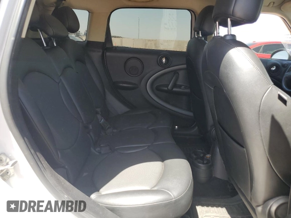 2016 MINI Countryman S with VIN WMWZC3C58GWT09694, listed as a Copart auction lot 57113235 with 126,082 mi miles and Salvage title. Bid and sale history available at DreamBid. Image 10.