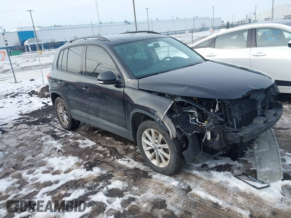 2017 Volkswagen Tiguan S with VIN WVGBV7AX7HK047973, listed as a IAAI auction lot 41197329 with 92,960 mi miles and . Bid and sale history available at DreamBid. Image 1.