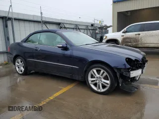 2009 Mercedes-Benz CLK-Class 3.5L with VIN WDBTK56F69T103711, listed as a Copart auction lot 49587035 with 48,244 mi miles and Salvage Title. Bid and sale history available at carsss.com. Image 1.