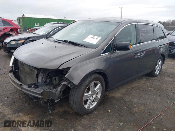 2012 Honda Odyssey Touring with VIN 5FNRL5H99CB071010, listed as a IAAI auction lot 41651233 with 186,913 mi miles. Bid and sale history available at carsss.com. Image 18.