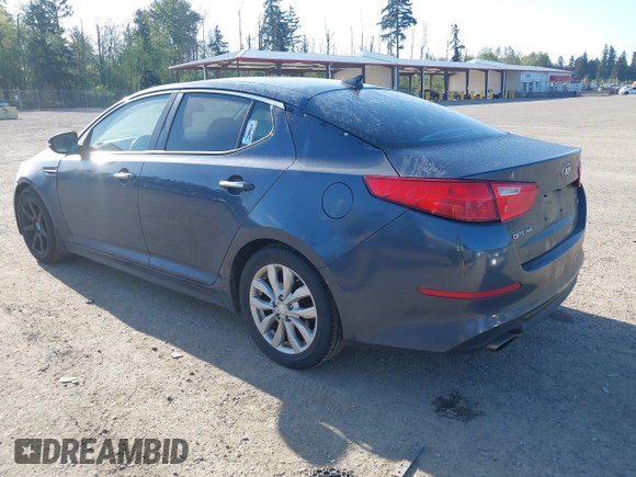 2015 Kia Optima EX with VIN 5XXGN4A77FG368704, listed as a IAAI auction lot 42174674 with 128,963 mi miles. Bid and sale history available at carsss.com. Image 3.